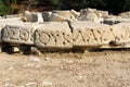 Stone with carved script in ancient Lycian city Patara. Turkey Royalty Free Stock Photo