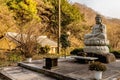 Stone carved sitting Buddha at Baegyangsa Temple Royalty Free Stock Photo