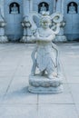 Stone carved statue of Buddhist guardian