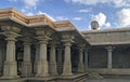 Stone carved temple and statue of Lord Bahubali in Shravanbela Gola, Karnataka Royalty Free Stock Photo