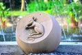 Stone carved into various animal shapes Beside the pool