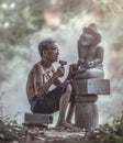 A stone carver at work