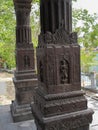 Stone carving art with human figure on the pillar of ancient architecture of India