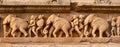 Stone carving bas relief panorama, Khajuraho Royalty Free Stock Photo