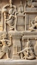 Stone carving bas relief sculptures on Adinath Jain Temple, famous indian tourist site Khajuraho, Madhya Pradesh, India, AI