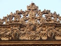 Stone carving at the top of a gate of a palace in India.