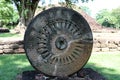 Stone carving of the wheel of the dharma. in archaeological site of Srithep ancient town in Petchaboon, Thailand.