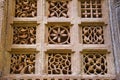 Stone carvings on outer wall of Jami Masjid Mosque, UNESCO protected Champaner - Pavagadh Archaeological Park, Gujarat, India. Royalty Free Stock Photo