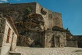 Stone castle facade with staircase and gateway Royalty Free Stock Photo