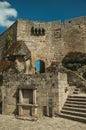 Stone castle facade with staircase and gateway Royalty Free Stock Photo