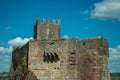 Stone castle and tower over rocky cliff Royalty Free Stock Photo