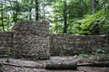 Stone castle wall in the forest Royalty Free Stock Photo