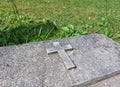 stone catholic christian cross at old cemetery in Ptuj. Slovenia