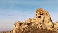 Stone cave houses with rocky landscape in Cappadocia