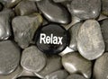 Stone In Center Saying 'Relax' For Encouragement Royalty Free Stock Photo