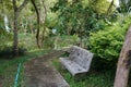 A stone chair of relaxing corner in the park