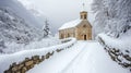 Stone Chapel and Snow Covered Path in a Mountain Valley Royalty Free Stock Photo