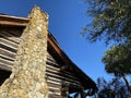 Stone chimney mountain log cabin Royalty Free Stock Photo