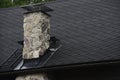 Stone chimney on the roof Royalty Free Stock Photo