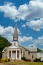 Stone Church on Hill with Wood Shingle Steeple Royalty Free Stock Photo