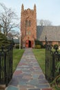 Stone church with open iron gate Royalty Free Stock Photo