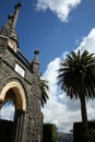 Stone church and palm tree Royalty Free Stock Photo