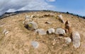 Stone circles in Cholpon Ata open air museum with ancient rock paintings, Issyk-Kul lake shore, Kyrgyzstan,Central Asia,unesco her Royalty Free Stock Photo