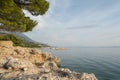 Stone cliff overlooking the sea and beach Royalty Free Stock Photo