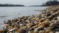 Stone coast beach lake on a sunny day Royalty Free Stock Photo