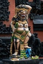 Stone colorful statues at the temple's entrance in Nusa Dua, Bali, Indonesia
