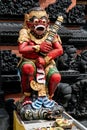 Stone colorful statues at the temple\'s entrance in Nusa Dua, Bali, Indonesia