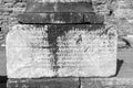 Stone columns written in ancient Greek in the open air museum of Turkey, Izmir, Ephesus. close up Royalty Free Stock Photo