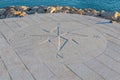 Stone compass by the sea Royalty Free Stock Photo
