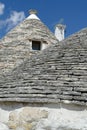 Stone coned rooves of trulli houses Royalty Free Stock Photo