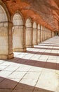 extensive stone corridor with lus rays coming in in the morning Royalty Free Stock Photo