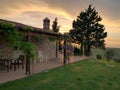 Stone cottage with patio  at sunset Royalty Free Stock Photo