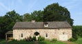 Historic colonial stone cottage at Poole Iron Forge USA