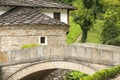 Stone countryhouse and stone bridge Royalty Free Stock Photo