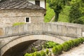 Stone countryhouse and stone bridge Royalty Free Stock Photo