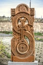 Stone cross carved with ornaments in the form of the thirty-first letter of the Armenian alphabet, created by Mesrop Mashtots in