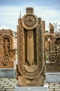 Stone cross carved with ornaments in the form of the twenty-ninth letter of the Armenian alphabet, created by Mesrop Mashtots in