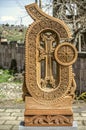 Stone cross carved with ornaments in the form of the twenty-third letter of the Armenian alphabet, created by Mesrop Mashtots in