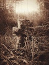 Stone cross cemetery headstone