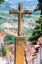 Stone Cross and Colonial Town Royalty Free Stock Photo