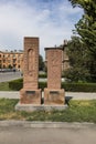 Stone cross in Echmiadzin Vagharshapat made of red stone tufa. Royalty Free Stock Photo