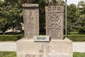 Stone cross in Echmiadzin Vagharshapat made of red stone tufa. Royalty Free Stock Photo