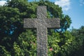 Stone cross on grave, gravestone on cemetery Royalty Free Stock Photo