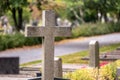 Stone cross on a graveyard in autumn.. Royalty Free Stock Photo
