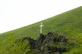 Stone cross in mountain Royalty Free Stock Photo