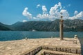 Stone cross on the island of St. Jerzego OstrÃÂ³w, Sveti Dorde. One of two islets near the coast of Perast in the Bay of Kotor.